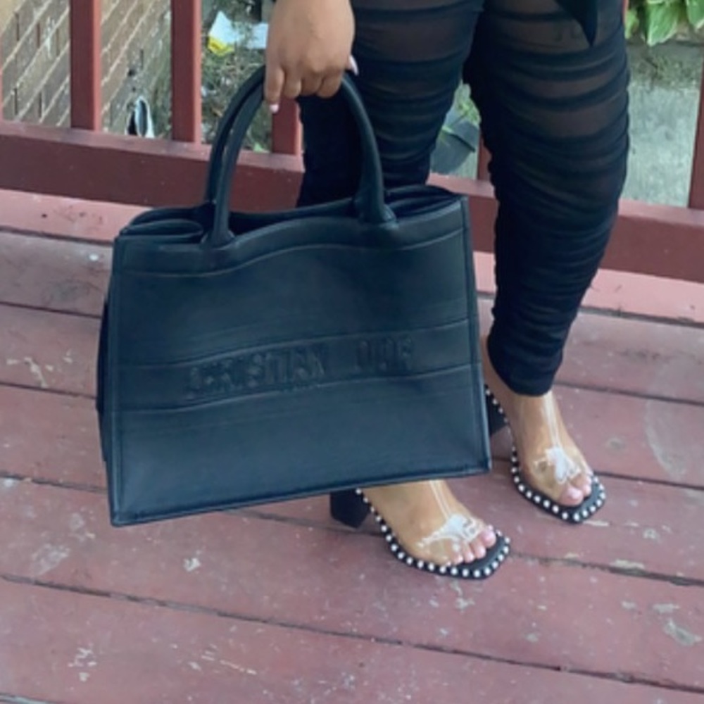 I’m selling my Christian Dior tote bag hardly worn new like shape